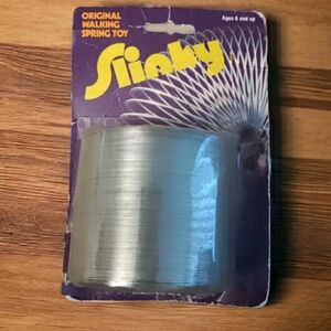 VINTAGE TOY 2 3/4" ACROSS ORIGINAL METAL SLINKY WALKING SPRING TOY In Package A7